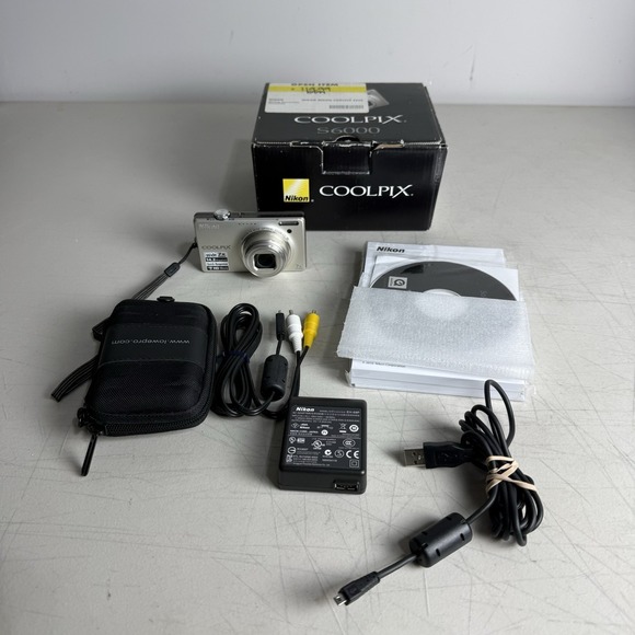 Nikon Other - Nikon COOLPIX S6000 14.2MP 7x Zoom Digital Camera Bundle w/ Charger & Battery